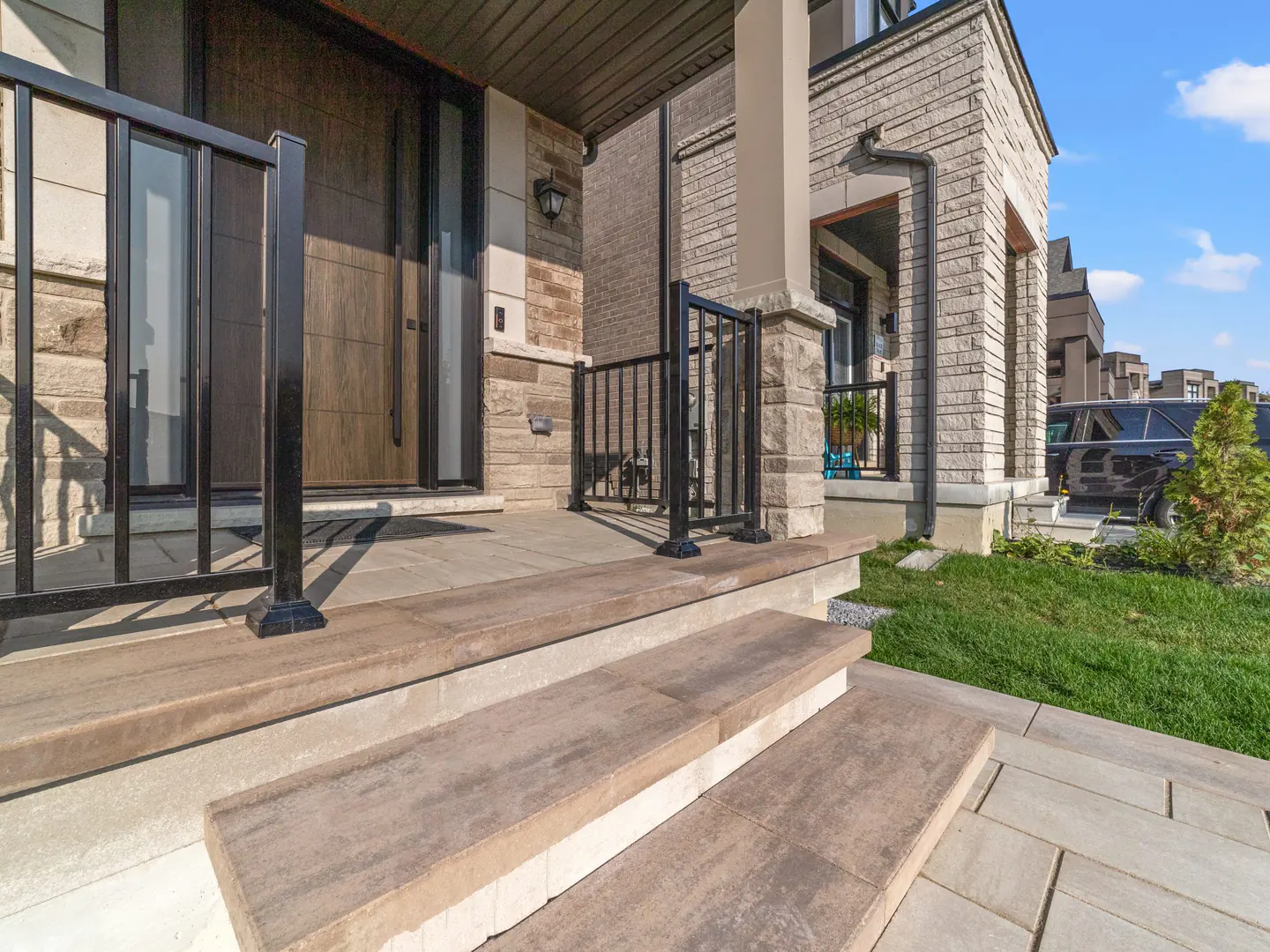 New aluminum picket guards on an existing front porch